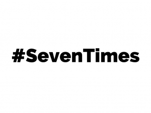 Black text reading #SevenTimes